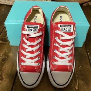 Adult converse all star low top sneakers in Red. W size 9 / M size 7.